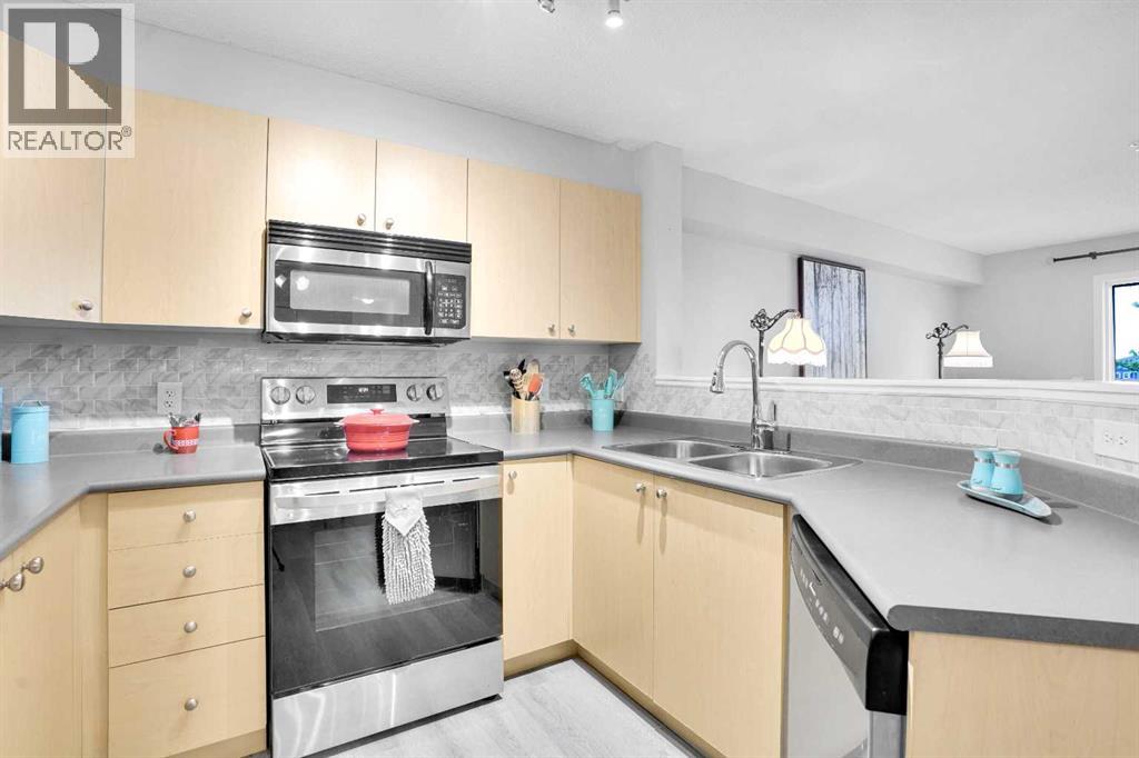 6211, 304 Mackenzie Way Sw, Airdrie, Alberta  T4B 3H6 - Photo 5 - A2260617