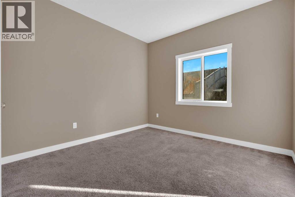 87 Baysprings Way Sw, Airdrie, Alberta  T4B 0R7 - Photo 15 - A2264015