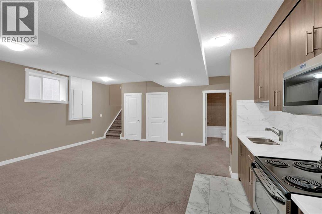 87 Baysprings Way Sw, Airdrie, Alberta  T4B 0R7 - Photo 25 - A2264015