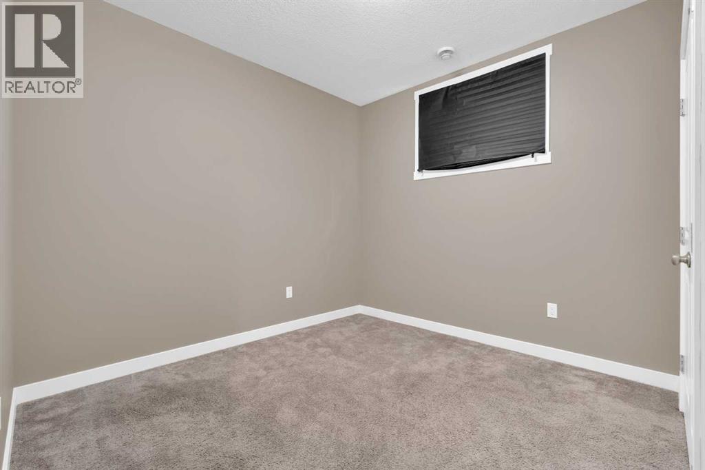 87 Baysprings Way Sw, Airdrie, Alberta  T4B 0R7 - Photo 26 - A2264015