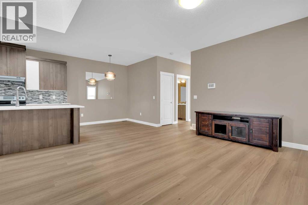 87 Baysprings Way Sw, Airdrie, Alberta  T4B 0R7 - Photo 5 - A2264015