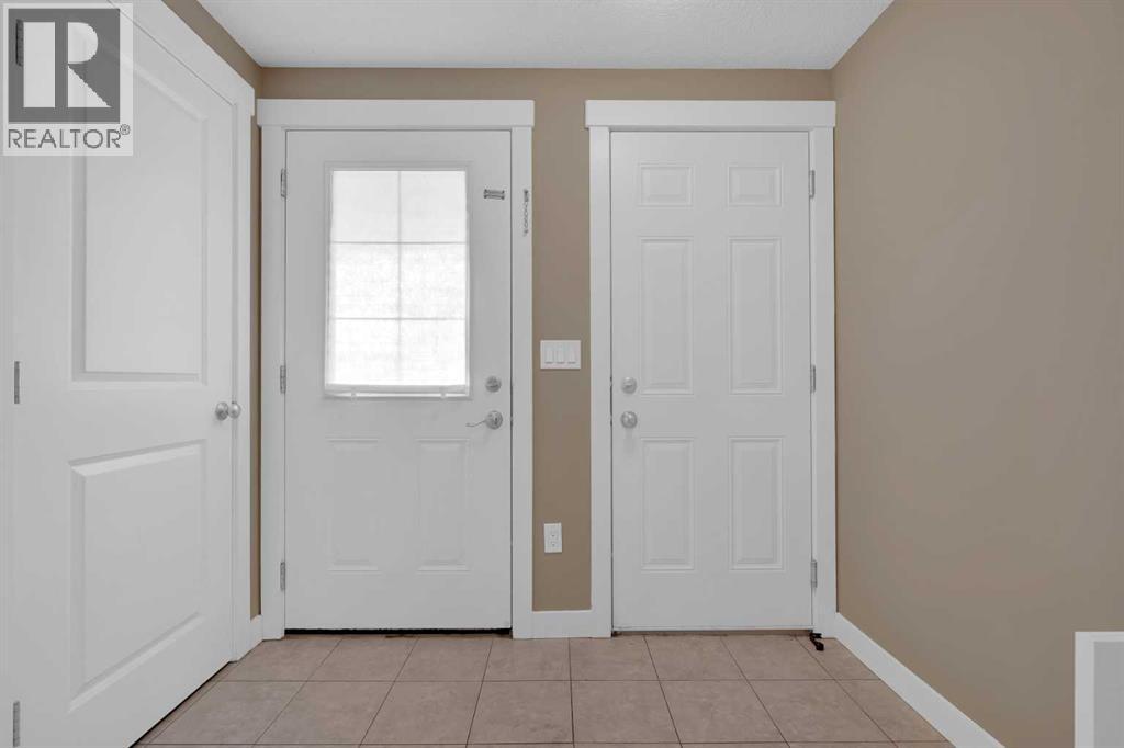 87 Baysprings Way Sw, Airdrie, Alberta  T4B 0R7 - Photo 3 - A2264015