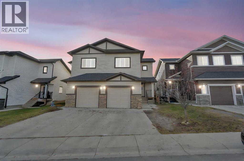 87 Baysprings Way Sw, Airdrie, Alberta  T4B 0R7 - Photo 2 - A2264015