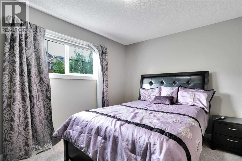 101 Pantego Lane Nw, Calgary, Alberta  T3K 0T1 - Photo 16 - A2251132