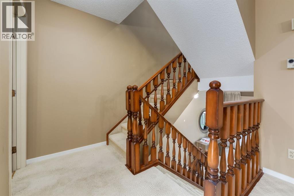 20 Point Mckay Court Nw, Calgary, Alberta  T3B 5B7 - Photo 9 - A2256827