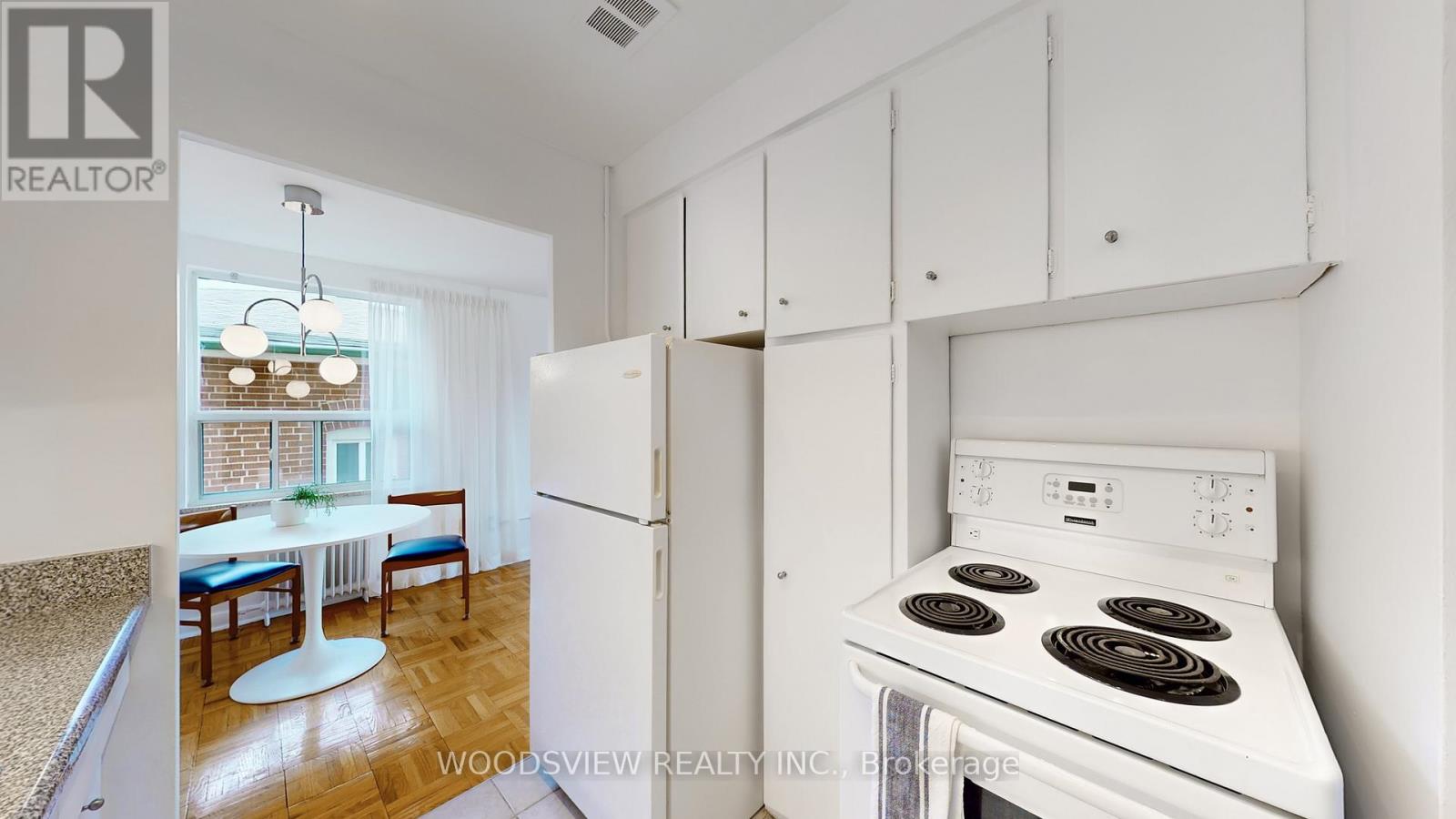 9 - 554 Harvie Avenue, Toronto, Ontario  M6E 4M1 - Photo 5 - W12510814