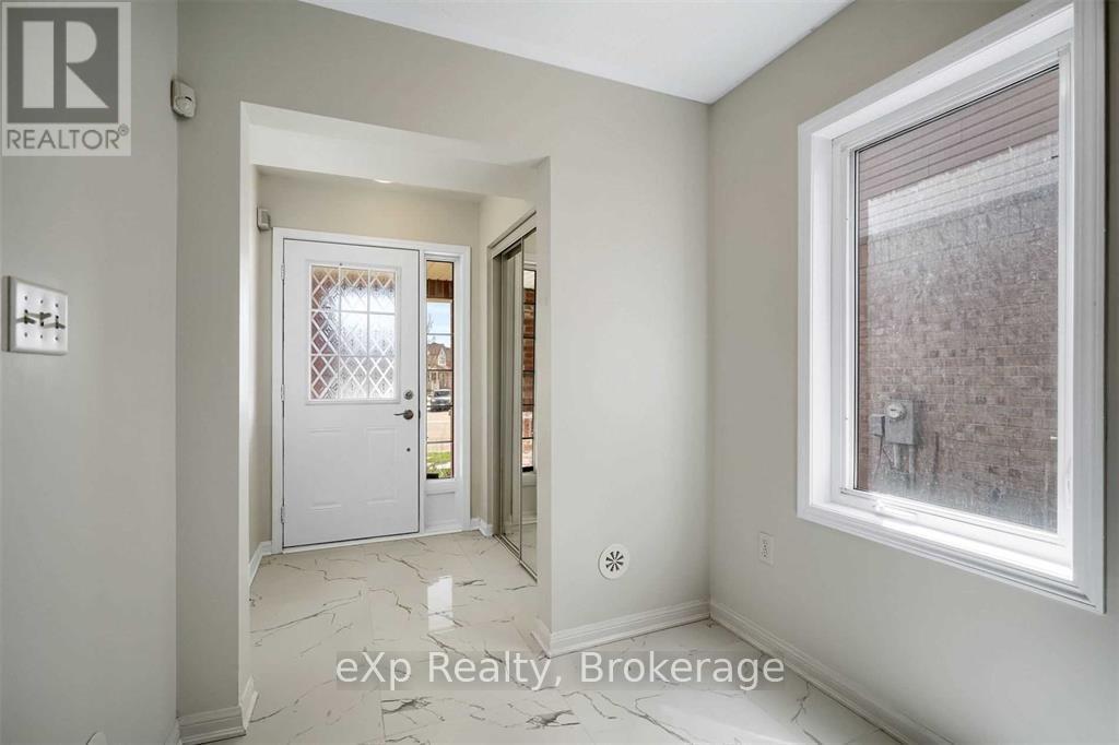 22 Donomore Drive, Brampton, Ontario  L7A 0S7 - Photo 3 - W12510952