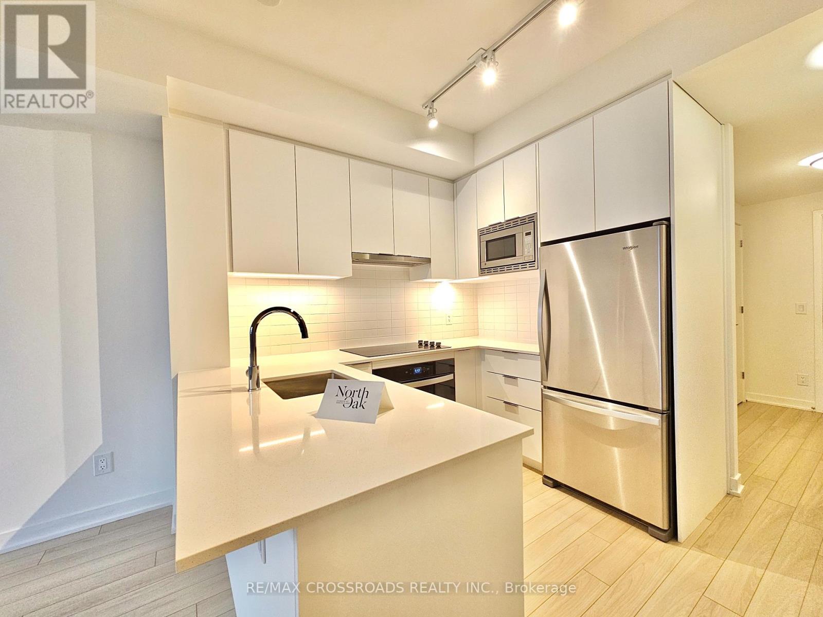 1710 - 3079 Trafalgar Road, Oakville, Ontario  L6H 8C5 - Photo 2 - W12510884