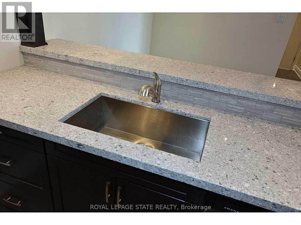 821 - 1450 Glen Abbey Gate, Oakville, Ontario  L6M 2V7 - Photo 8 - W12510896