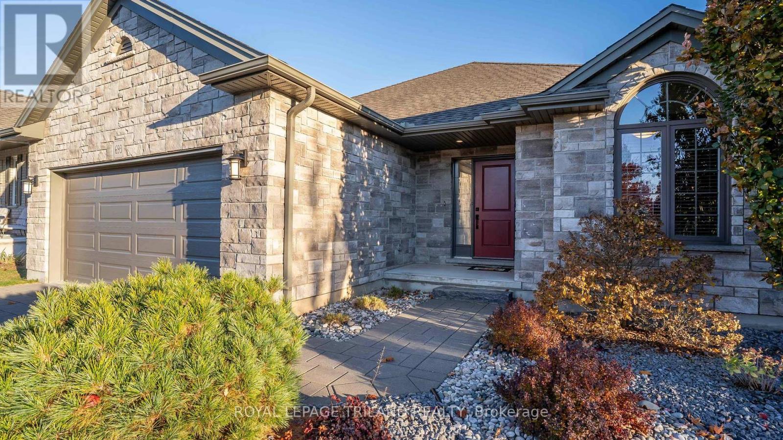 Welcome home! This beautifully maintained, 10-year-young bungalow is the ideal fit for a first-time buyer or right-sizer! Located in a vibrant, family-centric community just minutes from London, the 402, parks, trails, and delicious farm-fresh markets, this fantastic neighbourhood blends small-town charm and big-city convenience. This stylish 4-bedroom, 3-bath residence is MOVE-IN READY.  Step inside to the bright, open-concept main level, which features a living room anchored by a cozy GAS-FIRED FIREPLACE and oversized windows. A warm and beautifully designed kitchen featuring QUARTZ countertops, a WALK-IN PANTRY, and an open layout with clear sight lines to the dining and living room-perfect for everyday living and easy entertaining. Outdoors, enjoy your COVERED PATIO with a GAS HOOKUP - perfect for summer BBQs overlooking a FULLY FENCED yard and garden shed!  The main level also offers incredible convenience: you'll find a MAIN-FLOOR LAUNDRY, a chic powder room, and a front room ideal for a HOME OFFICE or guest bedroom. Retreat to your tranquil sanctuary with a spacious ENSUITE BATH with double sinks, walk-in closet, and extra storage closet. The FINISHED LOWER LEVEL is a major bonus! It offers two large bedrooms, a four-piece bath, and an EXPANSIVE FAMILY ROOM ready for movie nights. Ample storage throughout ensures you have ROOM TO GROW! This is more than just a house-it's an opportunity to embrace a vibrant, active community lifestyle, complete with top-rated schools and year-round events. STYLISH, WELL-MAINTAINED, AND PERFECTLY APPOINTED, this bungalow is ready for your family's next chapter. Don't let this chance pass by;  book your private tour and start making lifelong memories here! (id:48254)