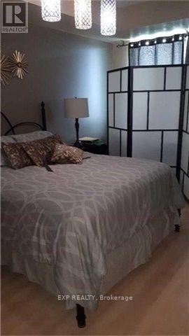 1005 - 100 John Street, Brampton, Ontario  L6W 0A8 - Photo 6 - W12503630