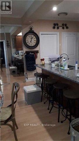 1005 - 100 John Street, Brampton, Ontario  L6W 0A8 - Photo 4 - W12503630