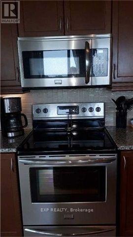 1005 - 100 John Street, Brampton, Ontario  L6W 0A8 - Photo 2 - W12503630