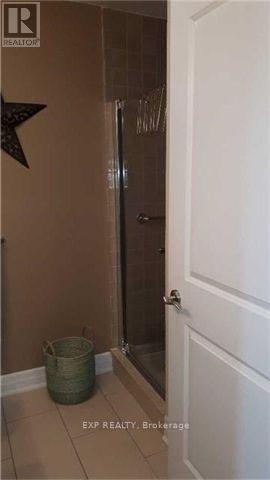 1005 - 100 John Street, Brampton, Ontario  L6W 0A8 - Photo 8 - W12503630