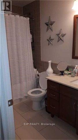 1005 - 100 John Street, Brampton, Ontario  L6W 0A8 - Photo 5 - W12503630