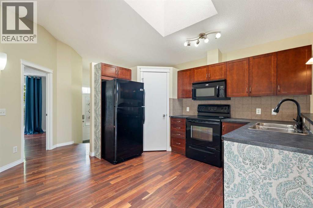 203 Auburn Bay Heights Se, Calgary, Alberta  T3M 0A8 - Photo 3 - A2261097