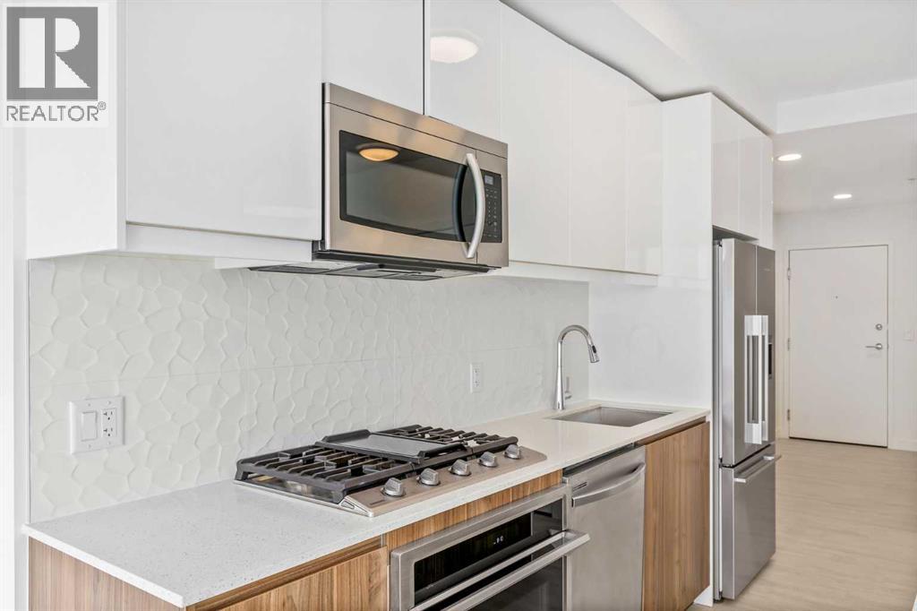 610, 327 9a Street Nw, Calgary, Alberta  T2N 1T7 - Photo 3 - A2258251