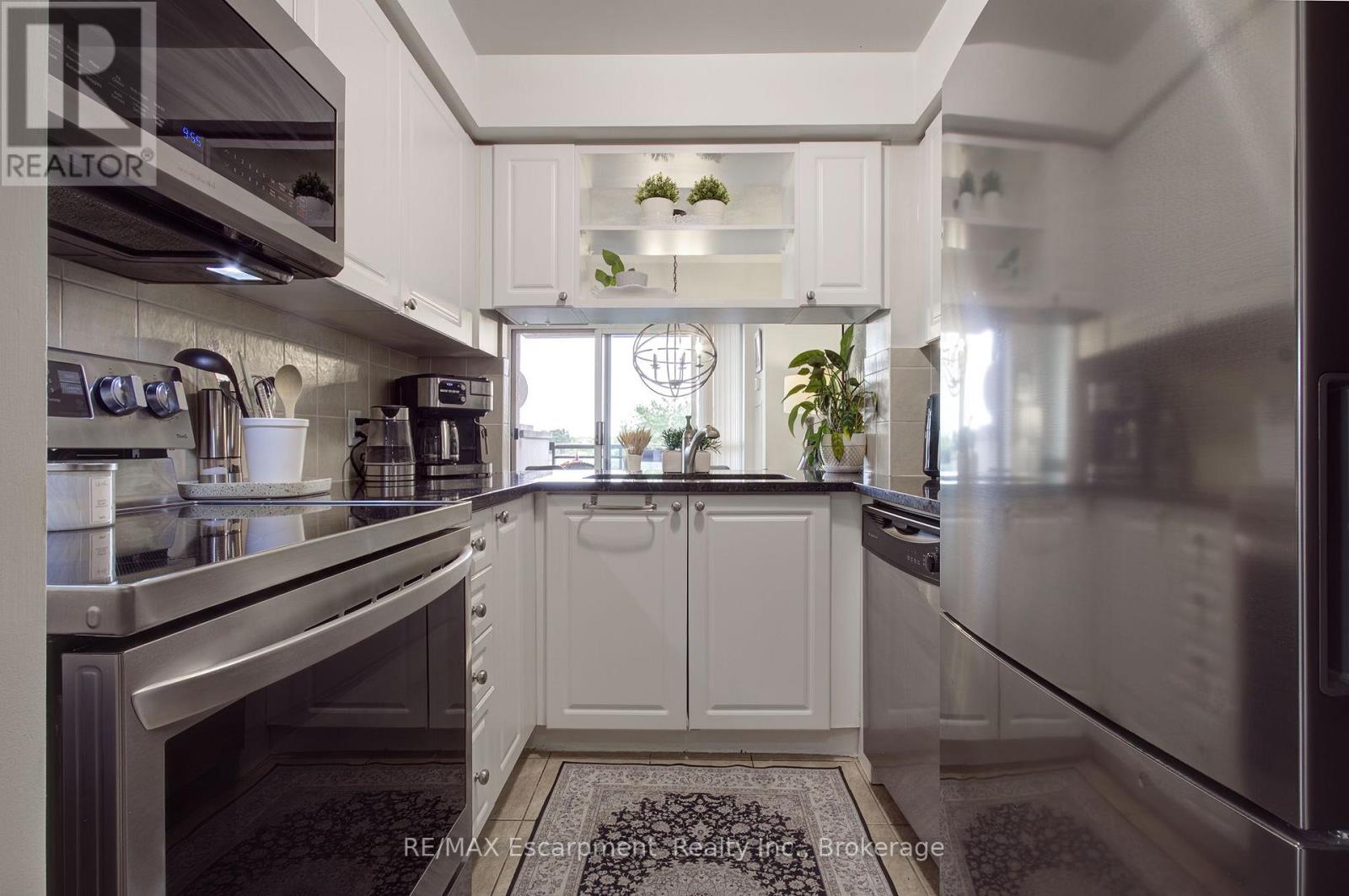 311 - 2325 Central Park Drive, Oakville, Ontario  L6H 0E2 - Photo 9 - W12511744