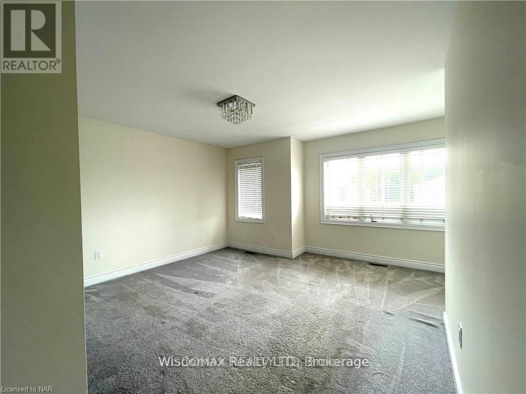 7729 Hackberry Trail, Niagara Falls, Ontario L2H 3R5 - Photo 17 - X12511854