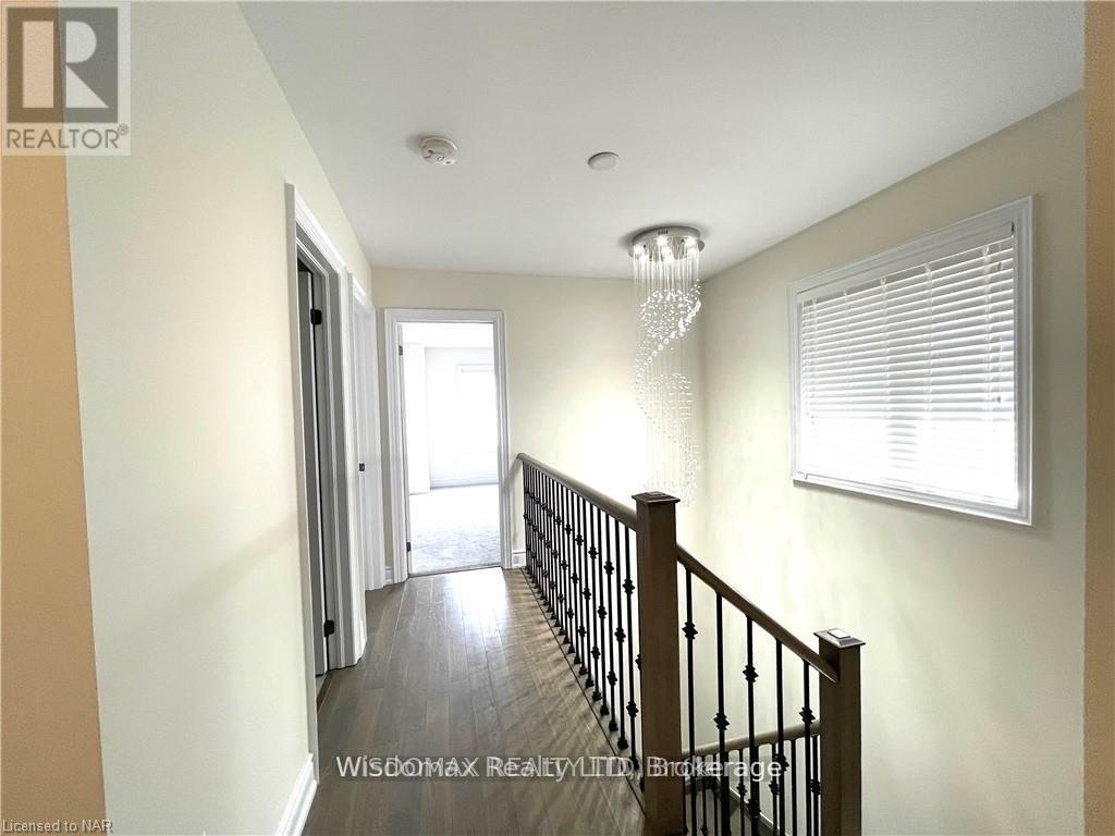 7729 Hackberry Trail, Niagara Falls, Ontario L2H 3R5 - Photo 22 - X12511854