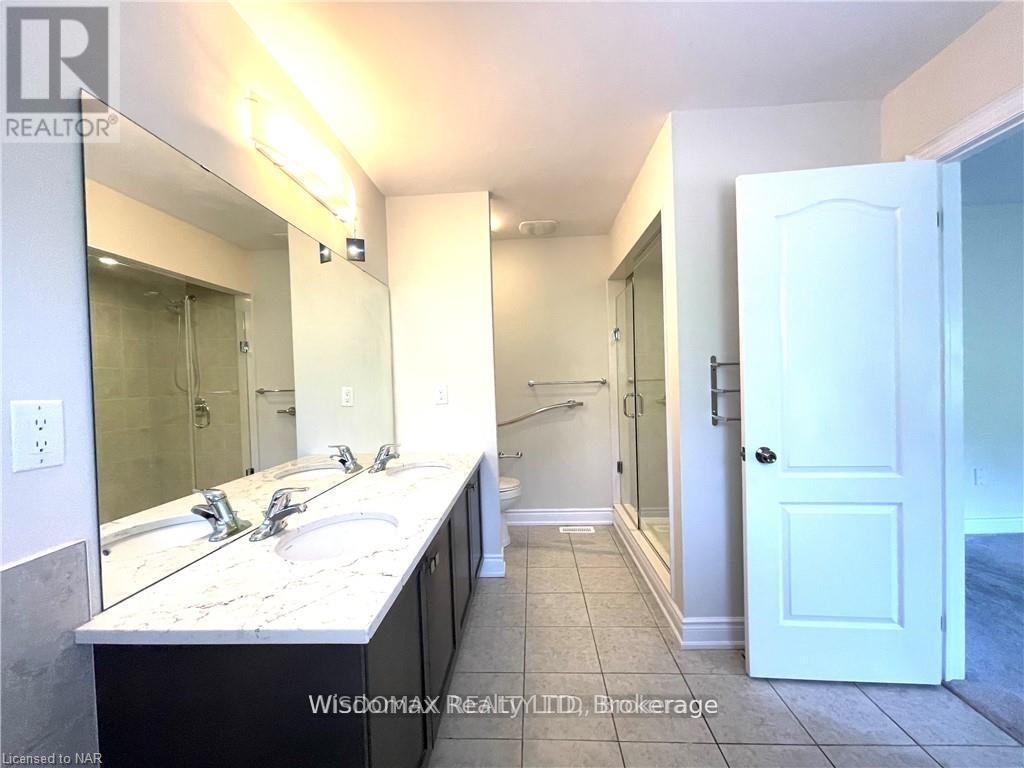 7729 Hackberry Trail, Niagara Falls, Ontario L2H 3R5 - Photo 23 - X12511854