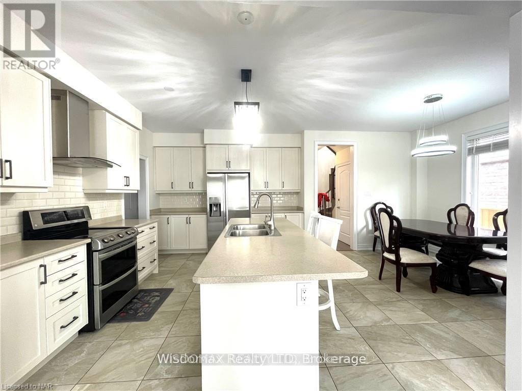 7729 Hackberry Trail, Niagara Falls, Ontario L2H 3R5 - Photo 6 - X12511854