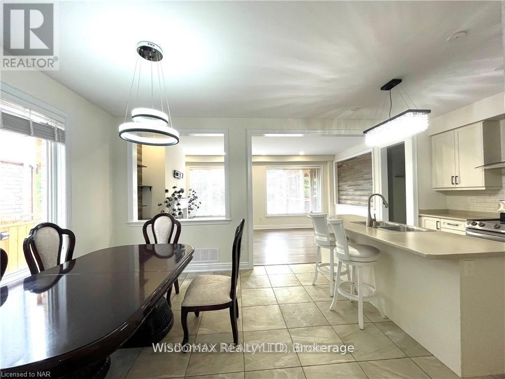 7729 Hackberry Trail, Niagara Falls, Ontario L2H 3R5 - Photo 9 - X12511854