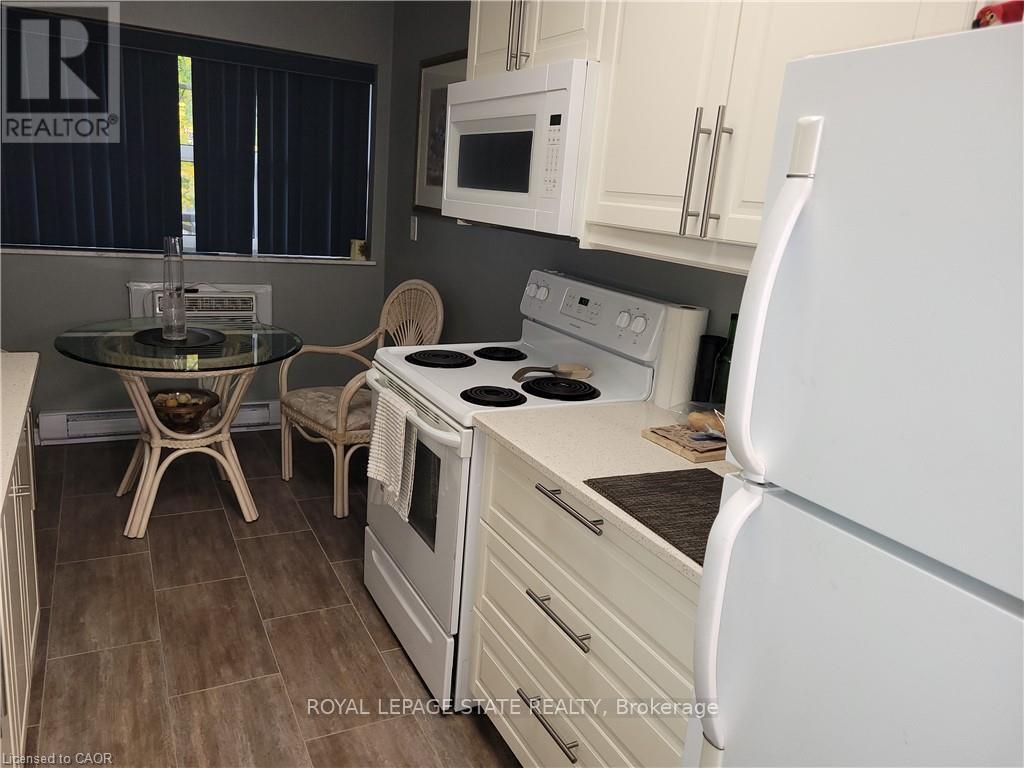 210 - 11 Woodman Drive S, Hamilton, Ontario  L8K 4E3 - Photo 8 - X12511620