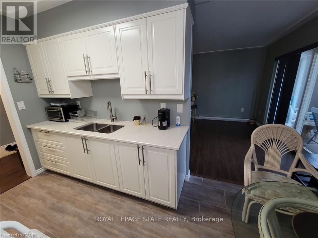 210 - 11 Woodman Drive S, Hamilton, Ontario  L8K 4E3 - Photo 9 - X12511620