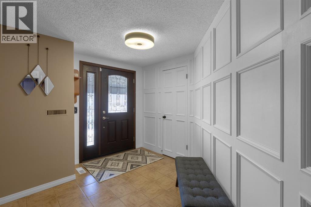 224 Ranchridge Bay Nw, Calgary, Alberta  T3G 1V4 - Photo 4 - A2267296