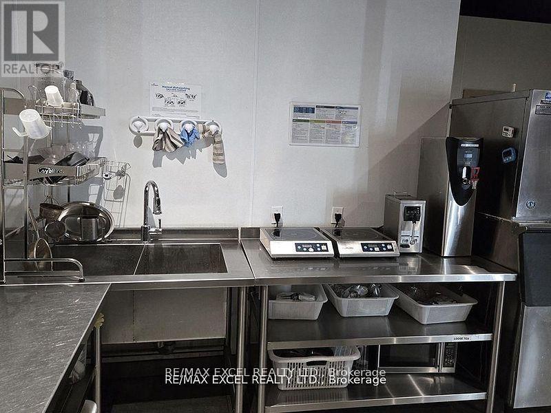 103 - 9471 Yonge Street, Richmond Hill, Ontario  L4C 0Z5 - Photo 7 - N12511806