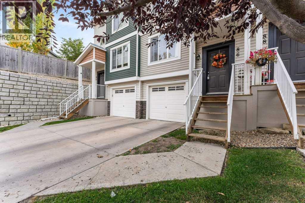 86 Pantego Lane Nw, Calgary, Alberta  T3K 0T1 - Photo 1 - A2262201