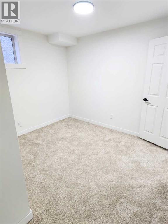 406 8 Avenue Se, High River, Alberta  T1V 1J3 - Photo 38 - A2268474