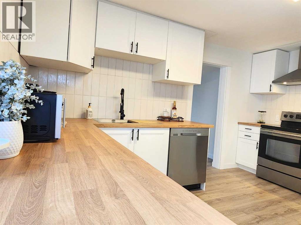 406 8 Avenue Se, High River, Alberta  T1V 1J3 - Photo 12 - A2268474