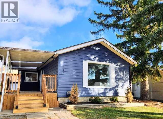 406 8 Avenue Se, High River, Alberta  T1V 1J3 - Photo 1 - A2268474