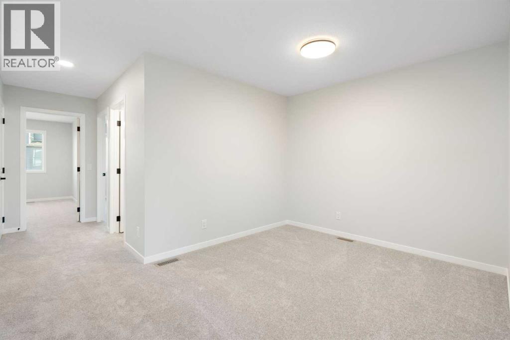 552 Rowmont Boulevard Nw, Calgary, Alberta  T3L 0L6 - Photo 19 - A2258333