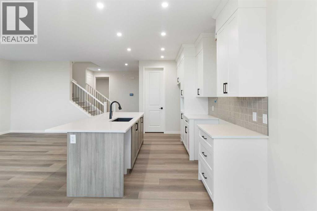 164 Belmont Place Sw, Calgary, Alberta  T2X 6C9 - Photo 7 - A2263502