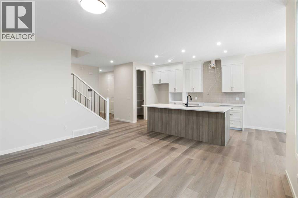 164 Belmont Place Sw, Calgary, Alberta  T2X 6C9 - Photo 5 - A2263502