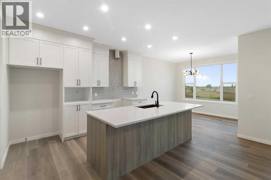 164 Belmont Place Sw, Calgary, Alberta  T2X 6C9 - Photo 4 - A2263502