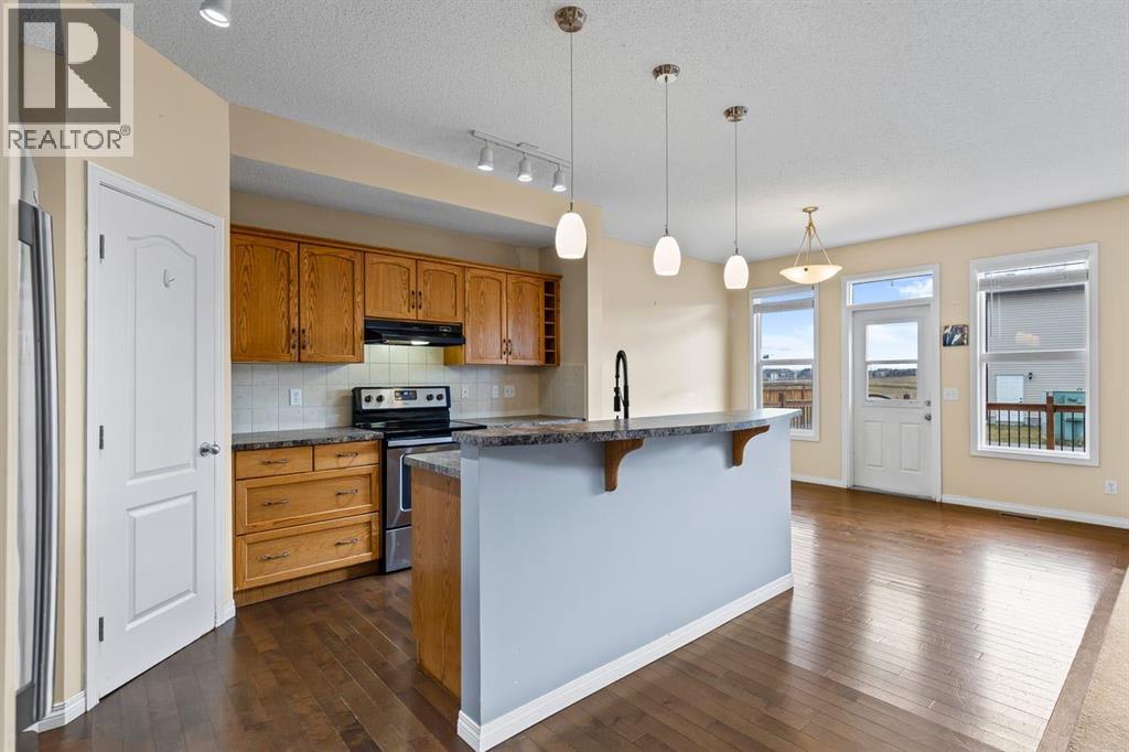 1043 Copperfield Boulevard Se, Calgary, Alberta  T2Z 4X6 - Photo 3 - A2268166