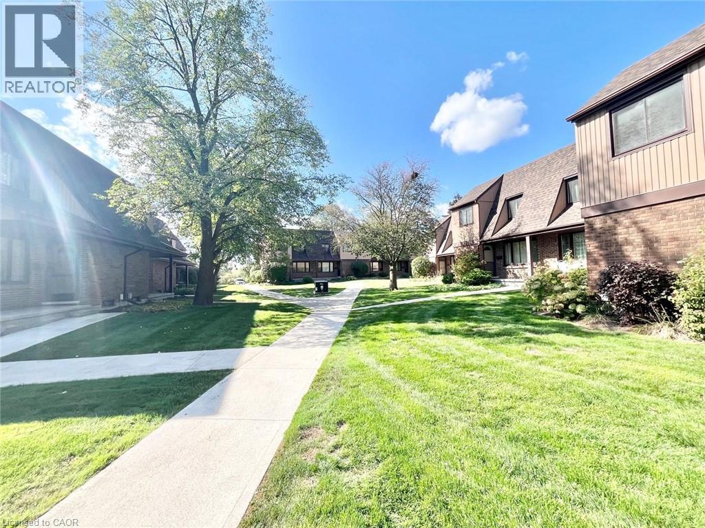 279 Sandowne Drive Unit# 8, Waterloo, Ontario N2K 2C1 - Photo 2 - 40785535