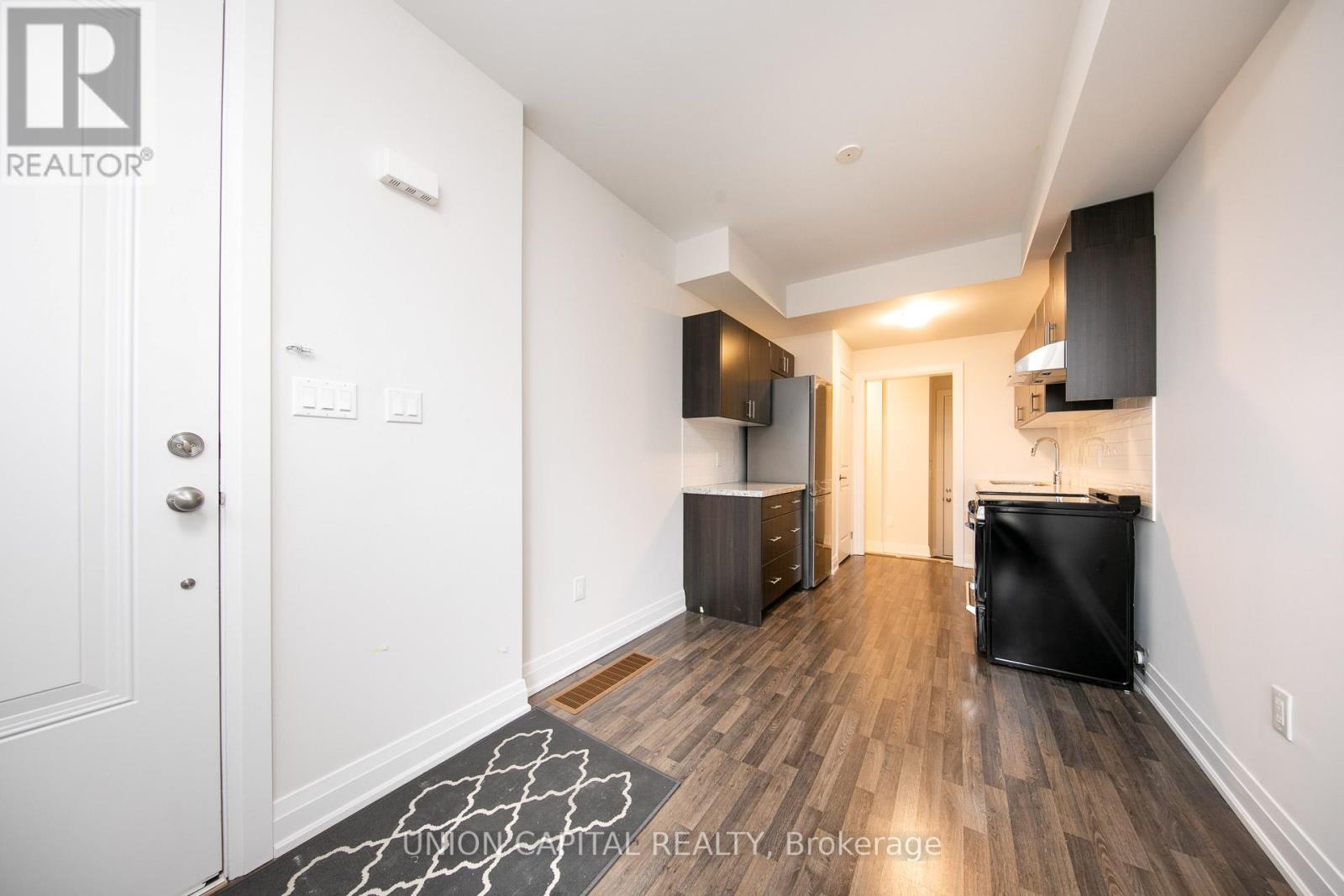 Main & Lower - 59 Creekbank Road, Toronto, Ontario  M6L 0A3 - Photo 2 - W12512642