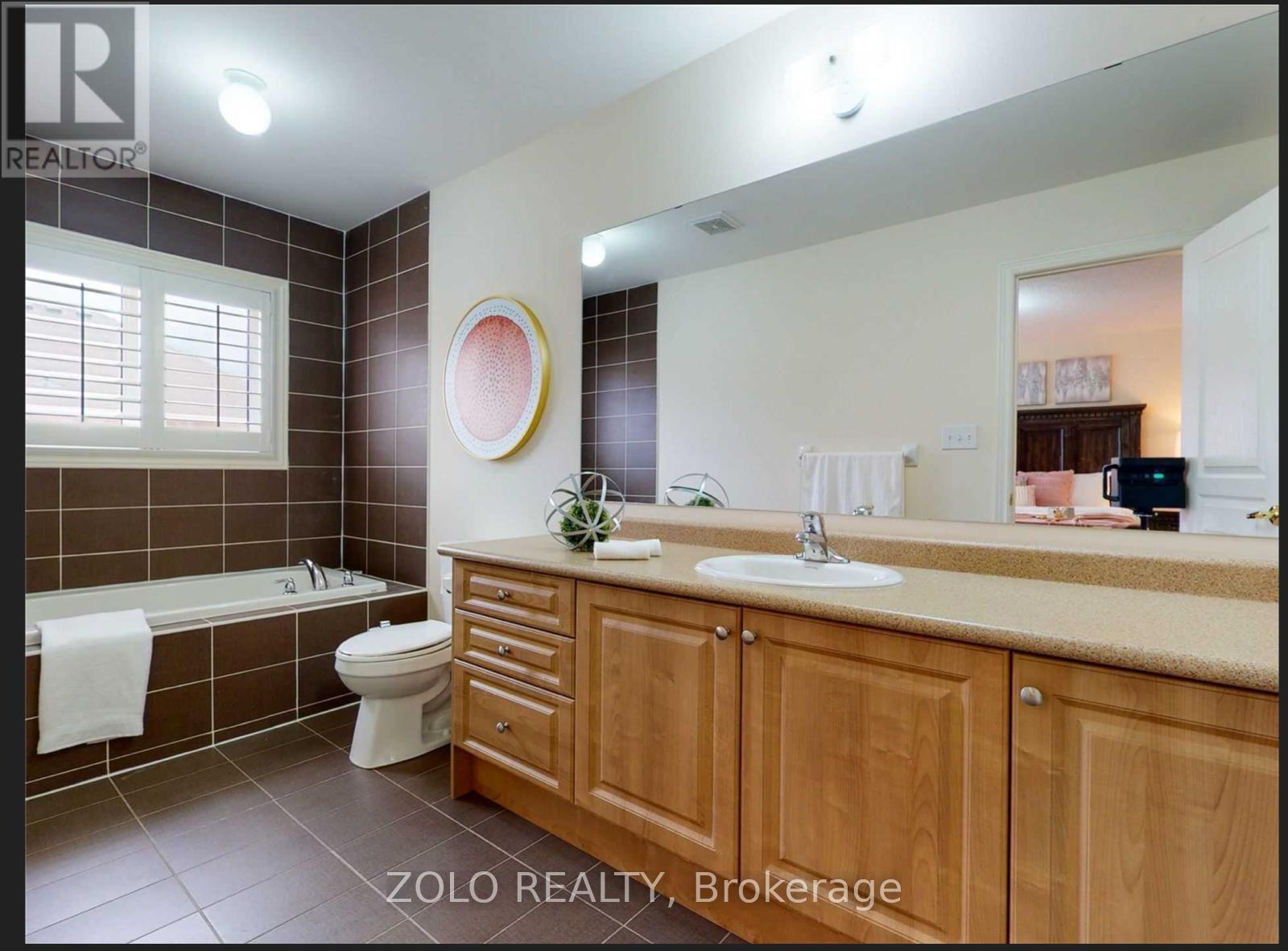 107 Thornbush Boulevard, Brampton, Ontario  L7A 4J9 - Photo 15 - W12512916