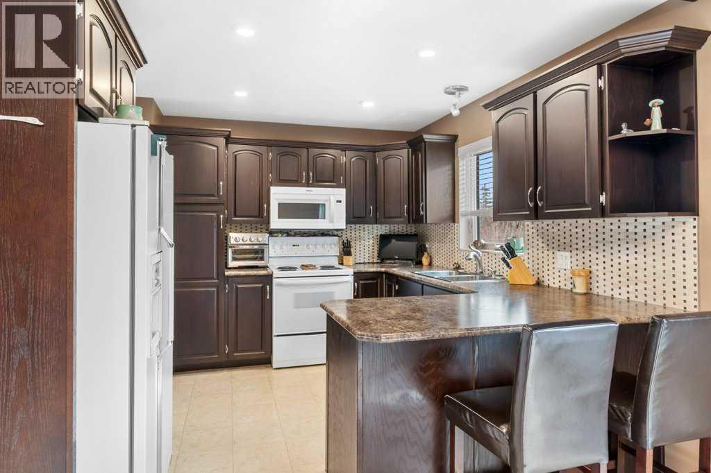 45 Ravenscrag Crescent N, Norglenwold, Alberta  T4S 1S5 - Photo 11 - A2268280