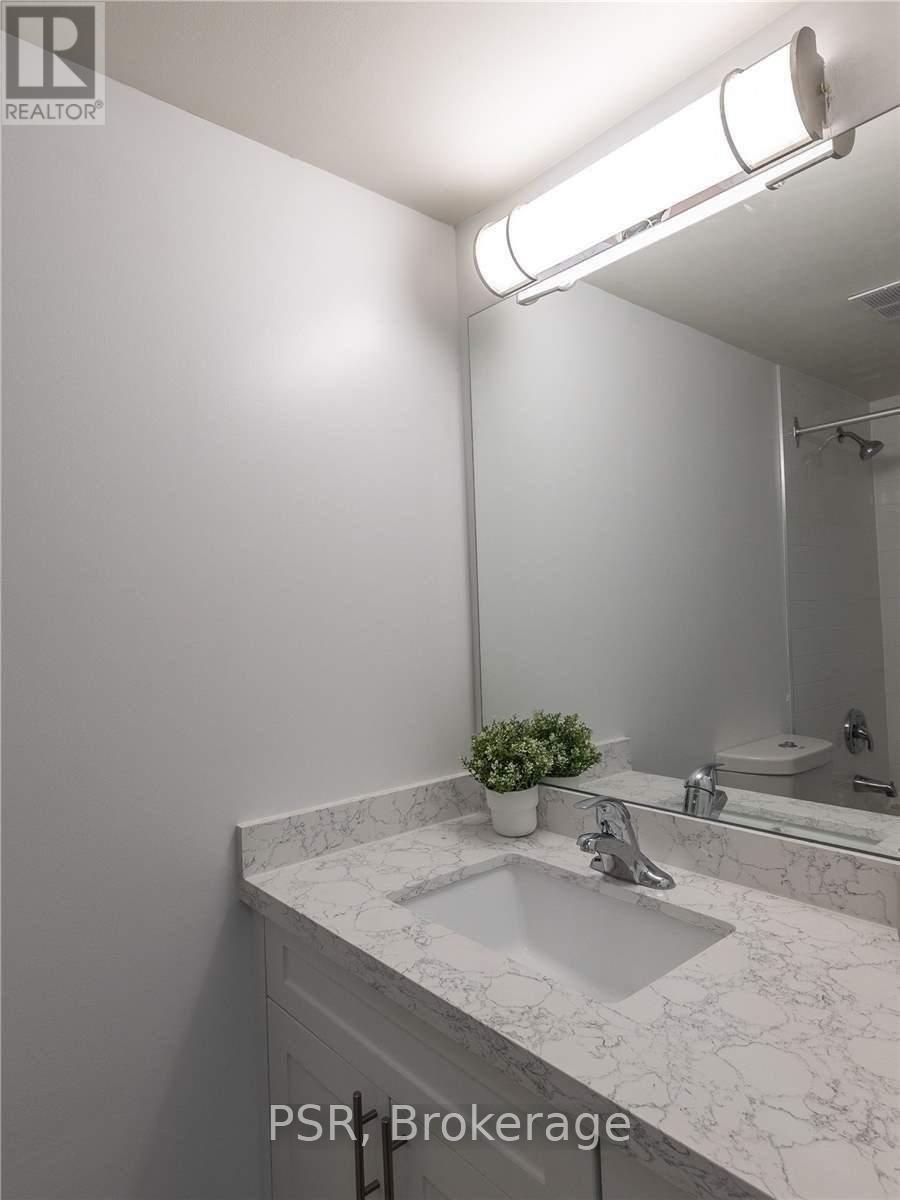 208 - 240 Markland Drive, Toronto, Ontario  M9C 1R3 - Photo 11 - W12513058