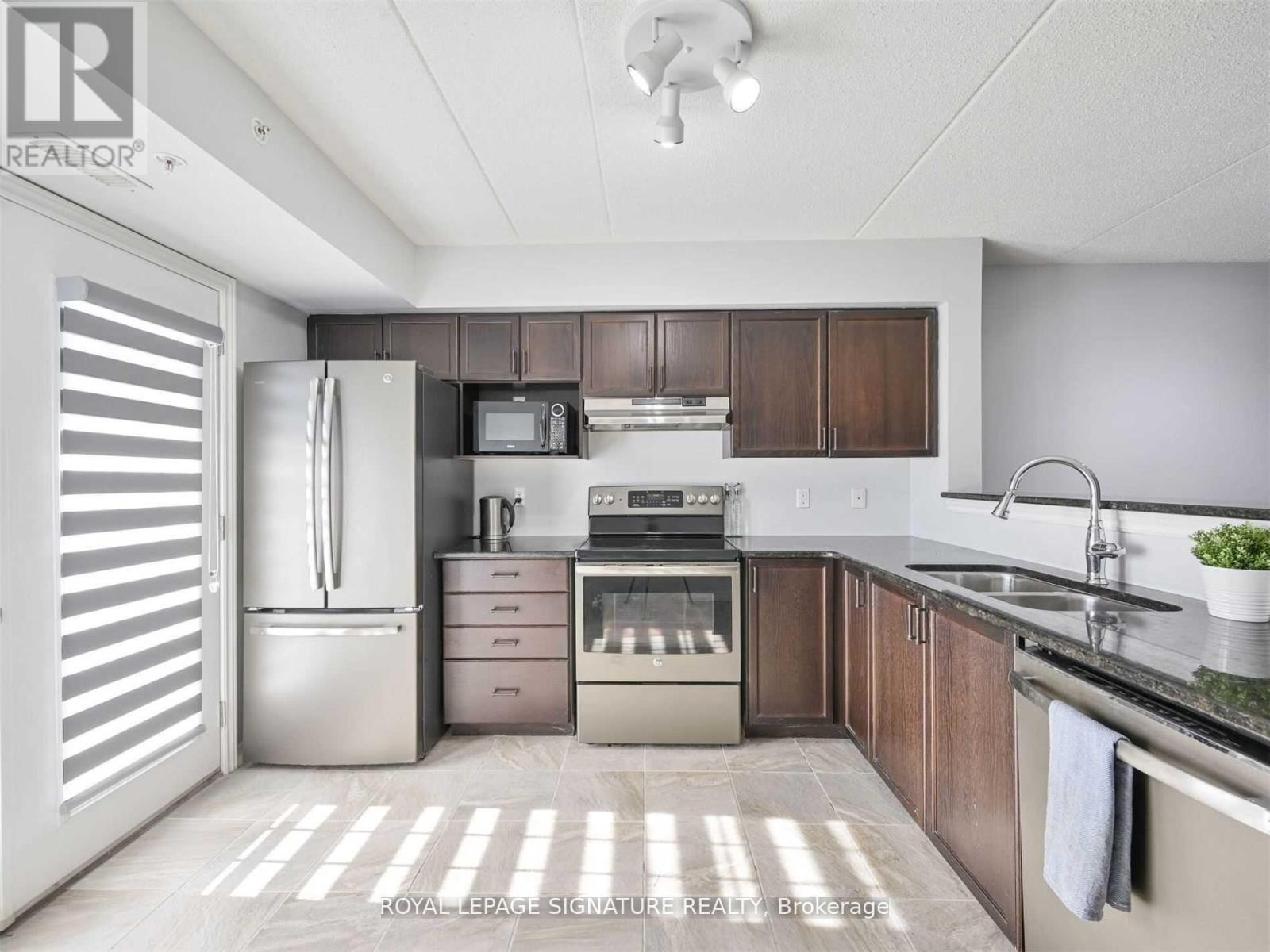 309 - 1450 Main Street E, Milton, Ontario  L9T 8W4 - Photo 11 - W12513374