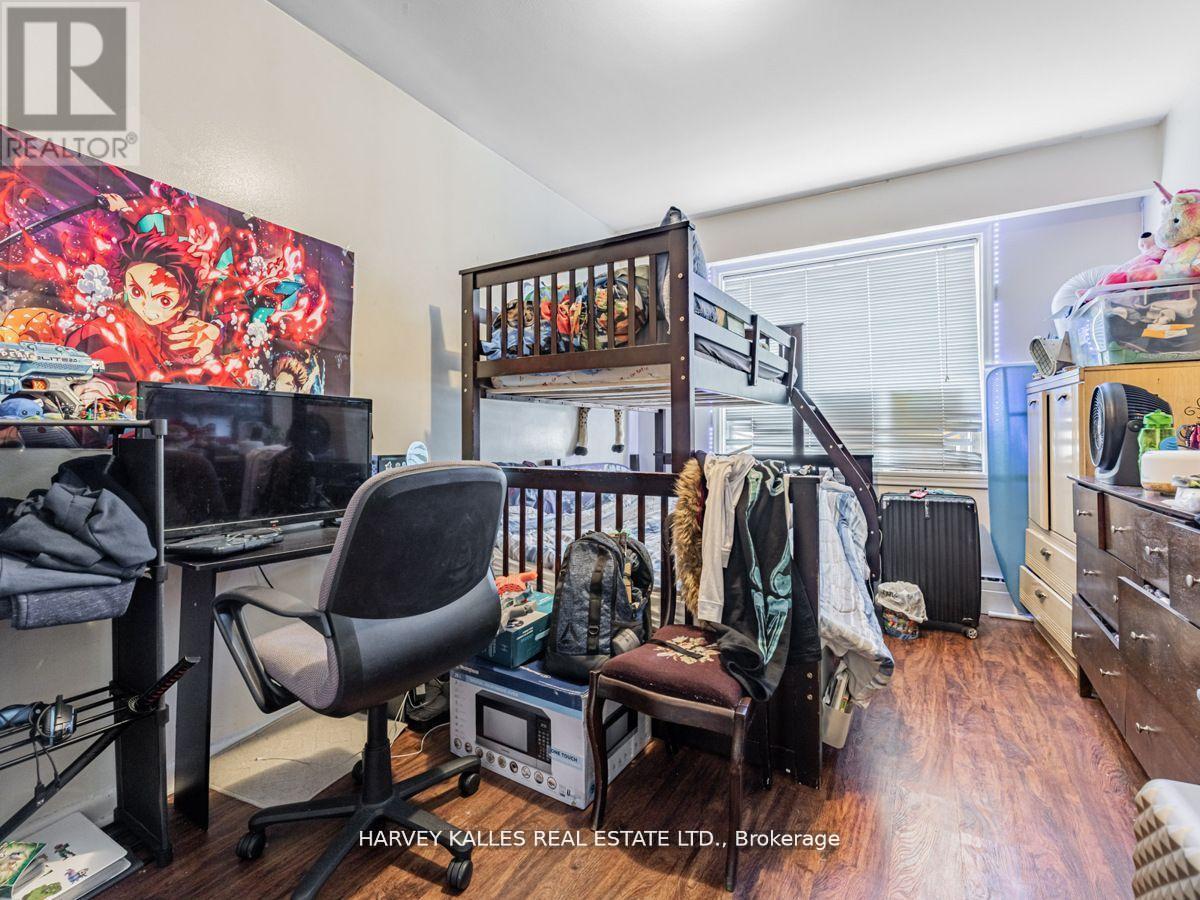 6 Carrington Avenue, Toronto, Ontario  M6E 2C3 - Photo 14 - W12513536