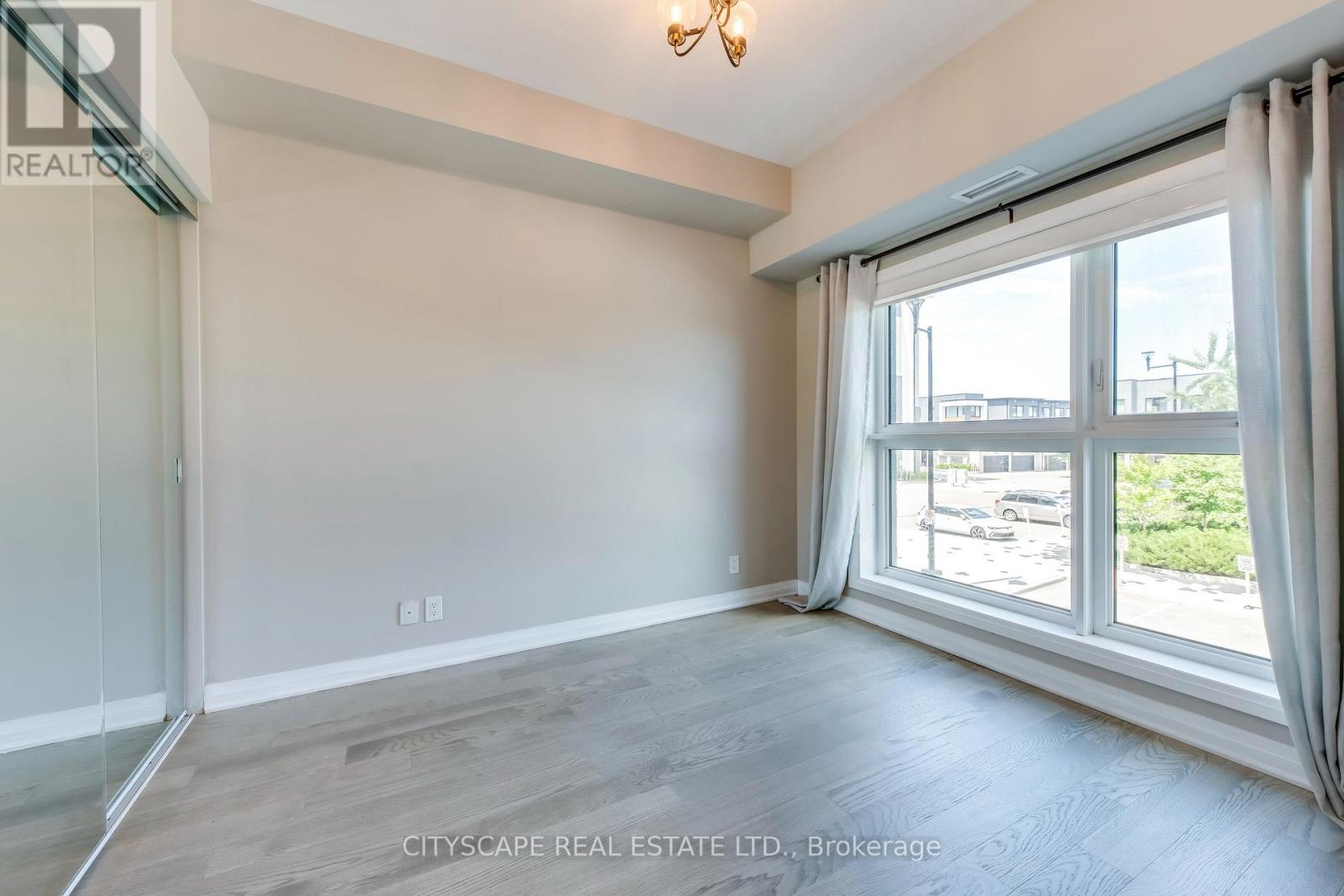 205 - 128 Grovewood Common, Oakville, Ontario  L6H 0X3 - Photo 12 - W12513644