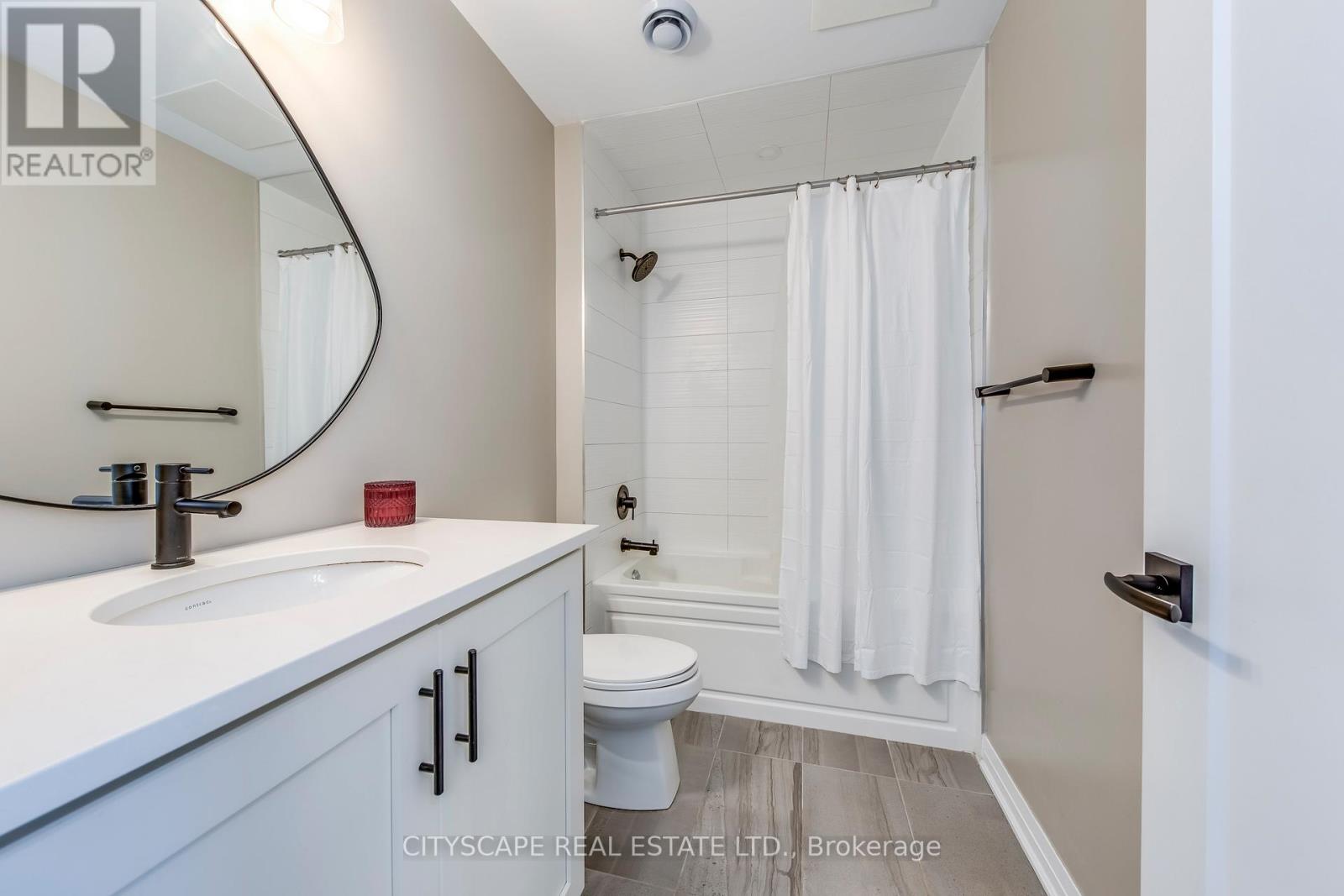 205 - 128 Grovewood Common, Oakville, Ontario  L6H 0X3 - Photo 13 - W12513644