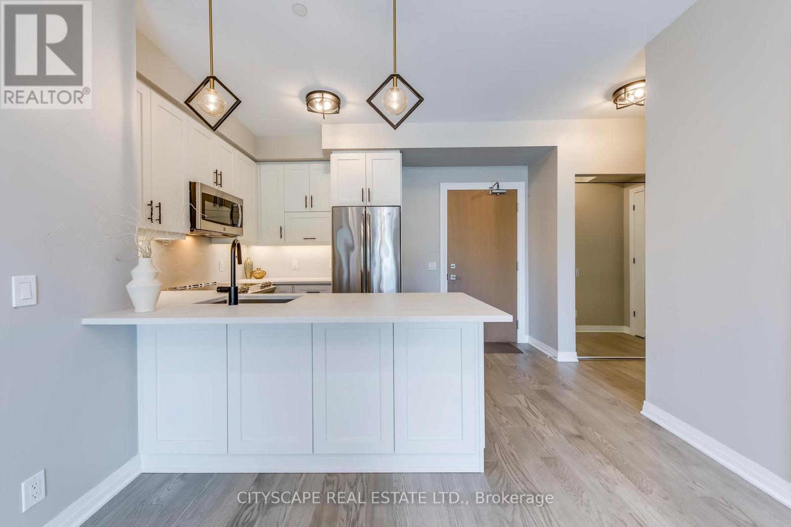 205 - 128 Grovewood Common, Oakville, Ontario  L6H 0X3 - Photo 3 - W12513644